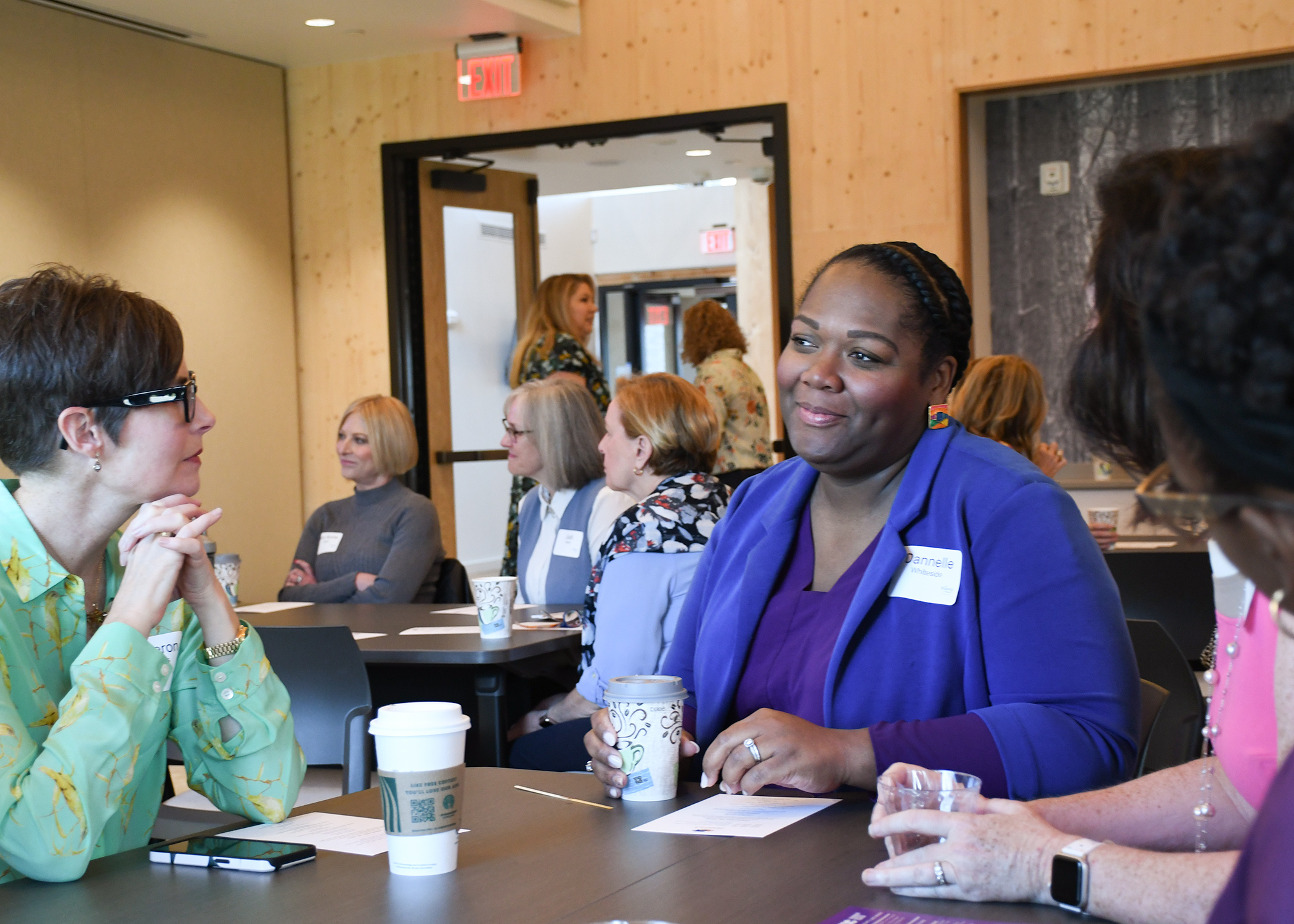 Women talk at the Coffee and Conversations event February 2024