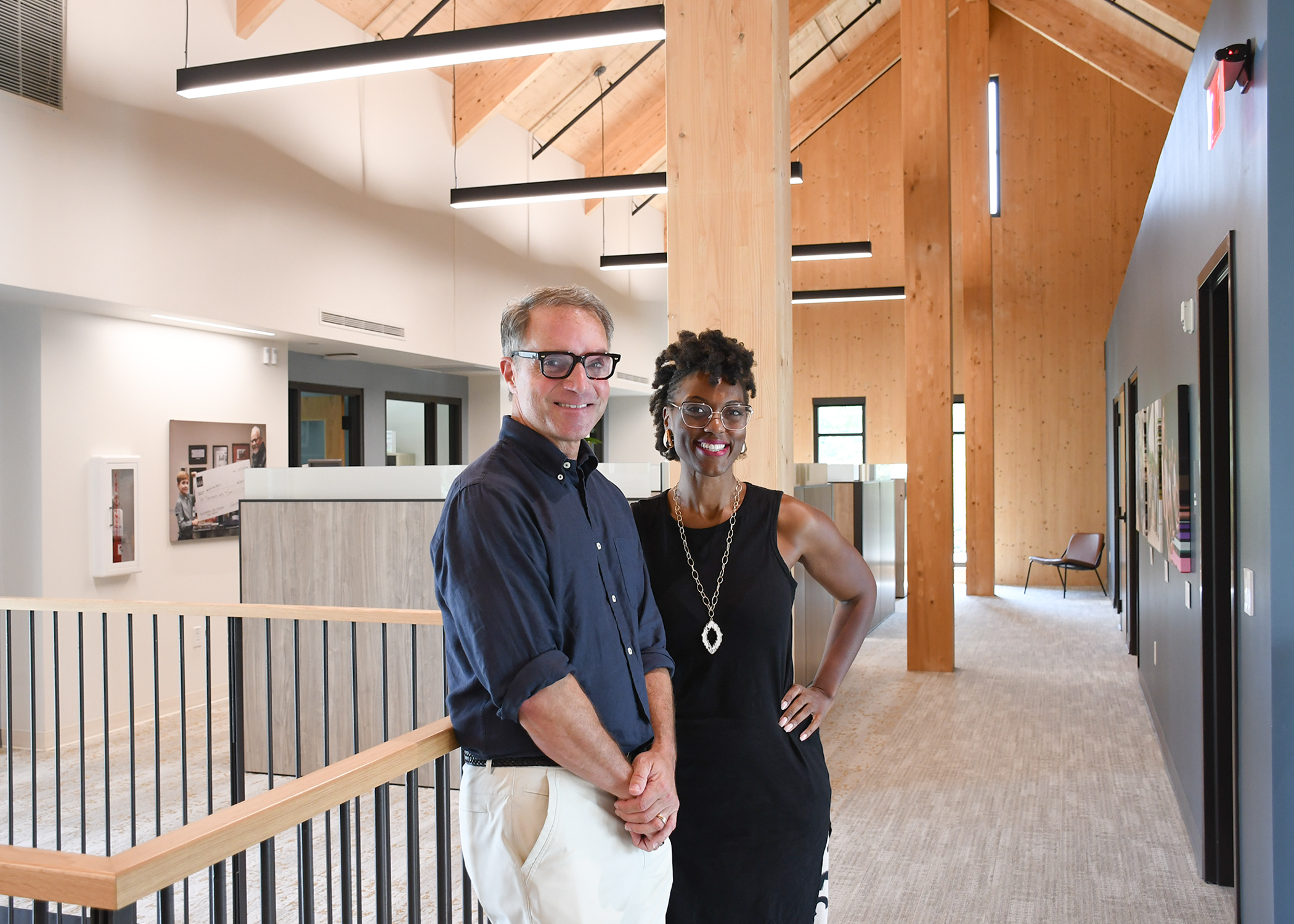 Hal Cato, CEO of CFMT, and Erika Burnett, VP of Community Development, pose together